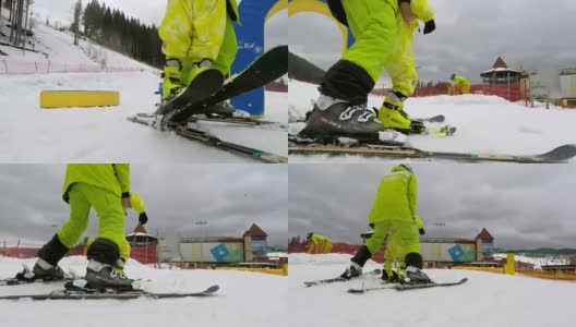 一位教练抱着一个婴儿上滑雪缆车。高清在线视频素材下载