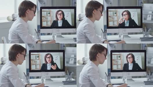 女同事通过电脑视频通话高清在线视频素材下载