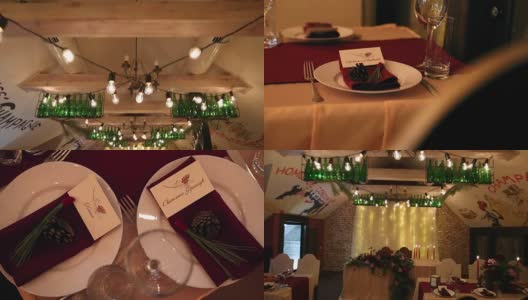 圣诞婚礼宴会厅的室内细节与餐厅的装饰和餐桌设置汇编。冬季装饰的球根花环，蜡烛，鲜花，球果和冷杉树枝高清在线视频素材下载