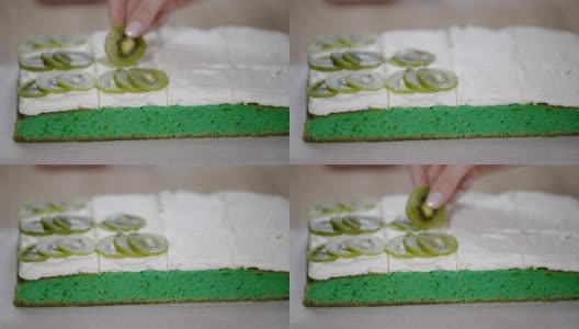 女人的手装饰蛋糕猕猴桃高清在线视频素材下载