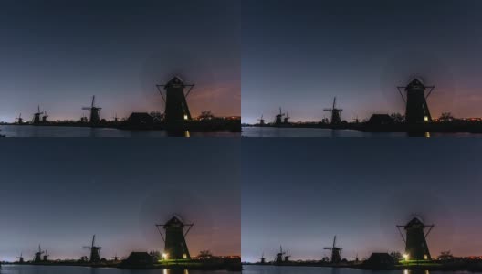 荷兰古老的风车上有令人惊叹的银河和成千上万颗闪亮的星星。美丽的荷兰。世界上最美丽的地方。宇宙就在手中高清在线视频素材下载