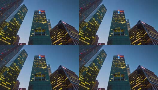 傍晚照亮了新加坡市中心，4k时间推移的全景高清在线视频素材下载