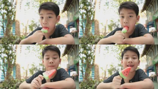 Little Asian boy enjoy with icecream .高清在线视频素材下载