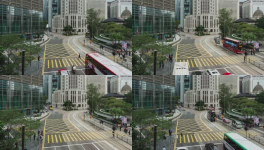 香港，中国- 2019年1月6日，交通繁忙的汽车和电车道路上的中国银行大厦。2019年1月6日，一群人在香港过马路。高清在线视频素材下载