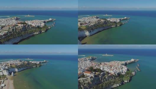 波利尼亚诺滨海阿普利亚市海岸线白色房屋和城堡在意大利无人机飞行高清在线视频素材下载