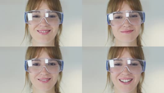 女性研究科学家的特写，医生戴着防护眼镜高清在线视频素材下载