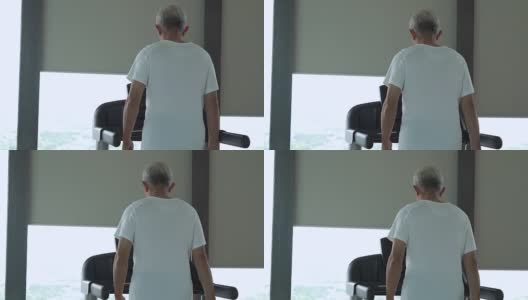 亚洲老年人在健身房的跑步机上跑步，锻炼健康的生活方式高清在线视频素材下载