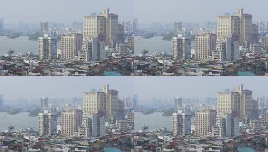 中国阳光日澳门城市景观生活部分屋顶海岸线全景4k高清在线视频素材下载