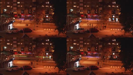 在傍晚的十字路口有交通灯和汽车高清在线视频素材下载