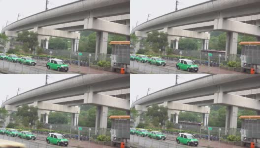 轻铁新界及香港天水围绿色的士高清在线视频素材下载