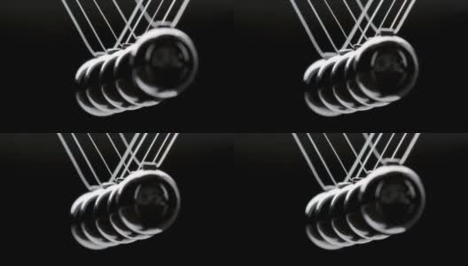 悬挂铬牛顿的球在运动的镜头高清在线视频素材下载
