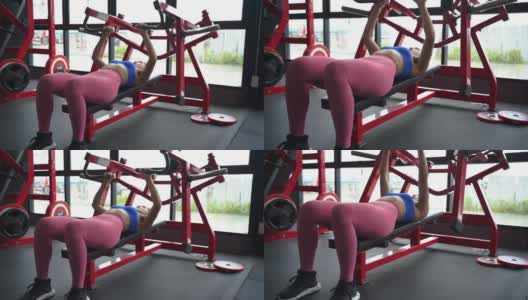 亚洲妇女在健身馆锻炼健康。高清在线视频素材下载