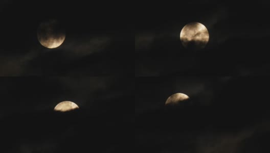2021年8月22日。蓝色的月亮跳舞。罕见的满月。天文现象。月亮以乌云为背景高清在线视频素材下载