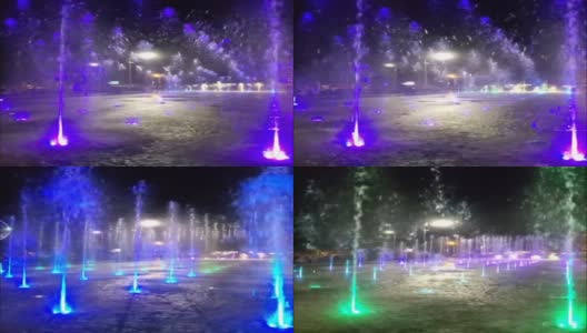 现代歌唱喷泉在城市广场，在晚上的公园。彩色歌唱喷泉特写，孩子们在夏天可以在上面奔跑高清在线视频素材下载