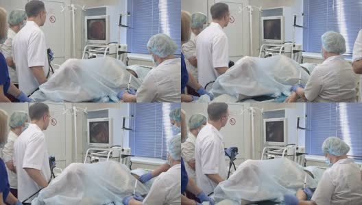 使用内窥镜进行手术的医疗队高清在线视频素材下载