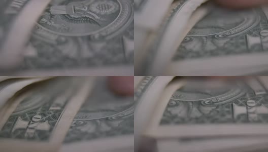 男人的手在数一美元钞票高清在线视频素材下载