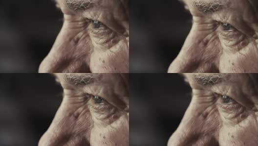 一个老人的眼睛的特写镜头:一个深思熟虑的老人高清在线视频素材下载