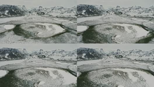 鸟瞰图火山口与冰川在山上的背景在冬天高清在线视频素材下载