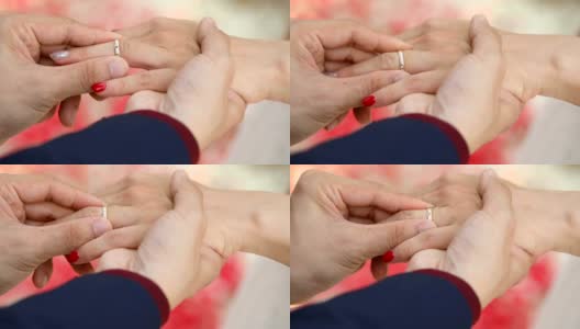 新娘和新郎在婚礼上交换结婚戒指。高清在线视频素材下载