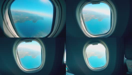 一架飞机的窗户，里面有水和陆地高清在线视频素材下载