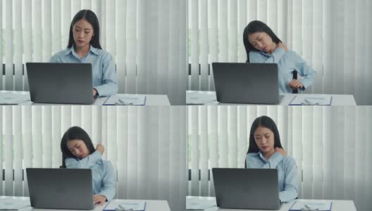一名长期工作的亚洲妇女在轻轻按摩手时肩膀疼痛。高清在线视频素材下载