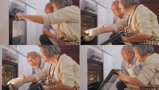 亚洲老人在家里做披萨。一位老妇人打开烤箱，把食物从机器里拿出来。老人看着饭，微笑着闻着，一起享受家庭活动。高清在线视频素材下载