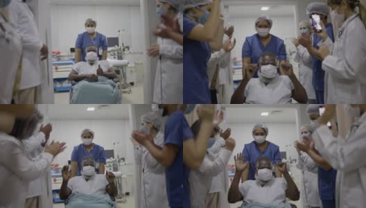 医生和护士戴着防护口罩庆祝老人康复出院高清在线视频素材下载