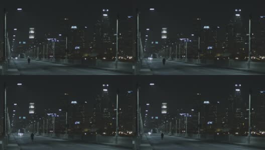 一个人在夜晚走在城市的街道上高清在线视频素材下载