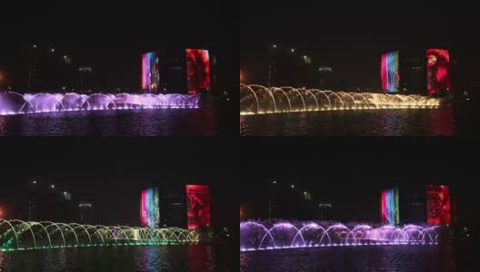 音乐喷泉，色彩斑斓的灯光和现代化的建筑高清在线视频素材下载
