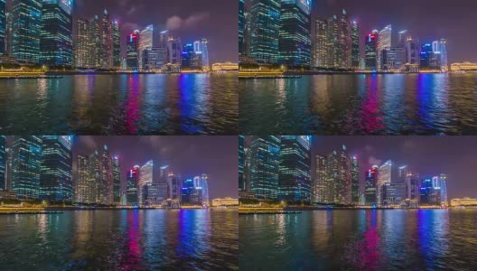 4K时光流逝:城市天际线，滨海湾和莱佛士广场的夜景高清在线视频素材下载