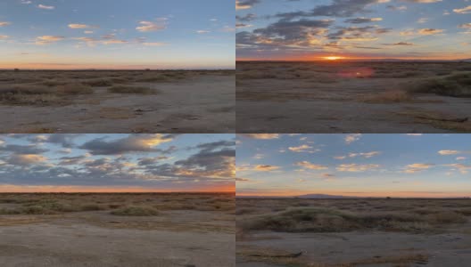 沙漠早晨日出垂直视频平移与云和橙蓝色的天空高清在线视频素材下载