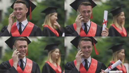 19、快乐的男同学打电话，收到毕业的祝贺高清在线视频素材下载