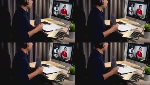 Business man  having Zoom video conferencing call via computer. Home office.高清在线视频素材下载
