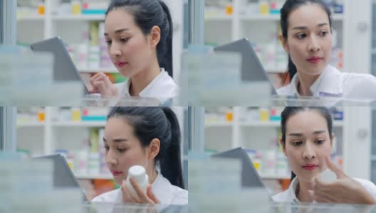 亚洲医生在药店工作。她在柜台为顾客研究药品。高清在线视频素材下载