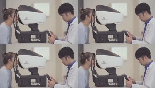 眼科医生在机器上分析检查结果高清在线视频素材下载