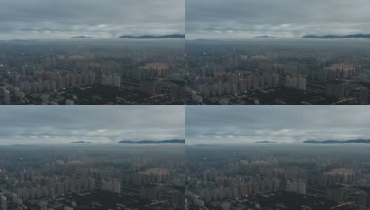 日落时城市景观的鸟瞰图高清在线视频素材下载