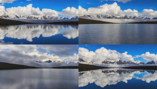 风和云在雪山上汹涌澎湃，这一切都反映在湖面上高清在线视频素材下载