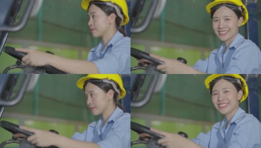 亚洲女工在工厂开叉车，看着镜头微笑高清在线视频素材下载