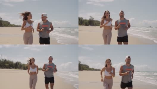 情侣一起在沙滩上跑步高清在线视频素材下载