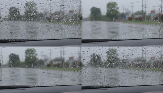 乡村道路上的雨点落在挡风玻璃上。高清在线视频素材下载