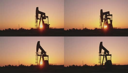 日落时分的油井抽油机高清在线视频素材下载