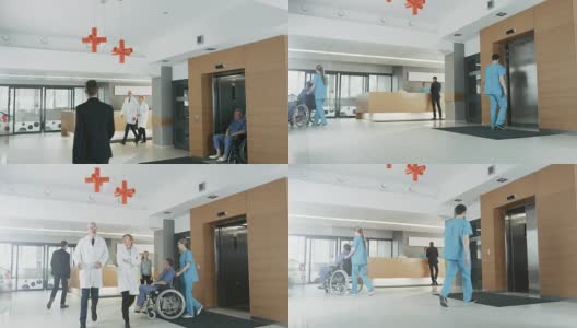 忙碌的医院一楼，医生、护士和工作人员忙碌，接待员与病人交谈，助理移动轮椅上的老人。拥有专业人员的新型现代化医院。高清在线视频素材下载