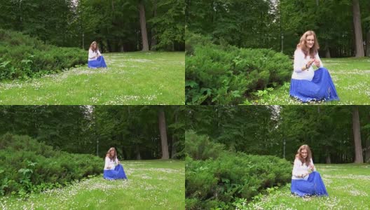 孕妇在公园草地上采摘雏菊。steadycam高清在线视频素材下载