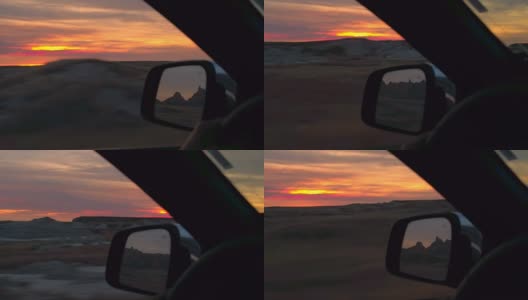 FPV:在令人惊叹的红色日落穿过荒地国家公园沙漠的公路旅行高清在线视频素材下载
