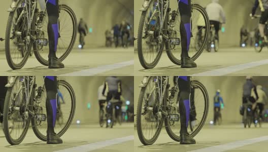 骑自行车的人在地下隧道高清在线视频素材下载