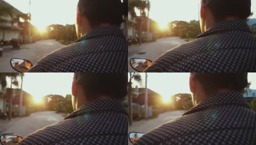 一名男子在热带岛屿上驾驶摩托车，在美丽的日落慢镜头中旅行。泰国。帕,1920 x1080高清在线视频素材下载