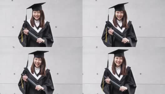毕业在东亚-年轻女子微笑着长袍和帽子高清在线视频素材下载