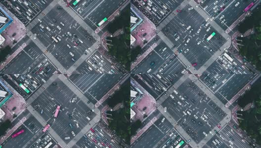 白天城市街道十字路口的无人机视点高清在线视频素材下载