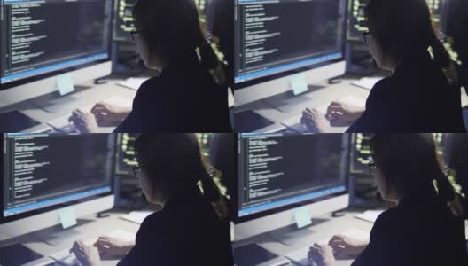 女人写代码，看着屏幕高清在线视频素材下载