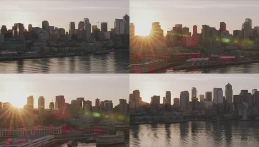 日出时，太阳从西雅图市中心的建筑物后面探出头来。高清在线视频素材下载